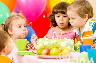 Children with birthday cake